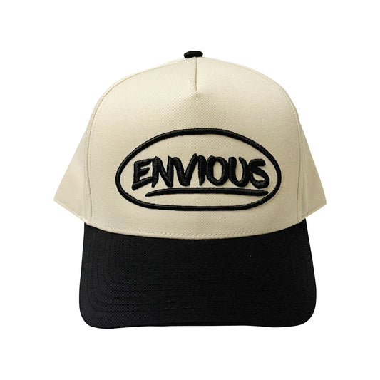 Envious black and cream hat